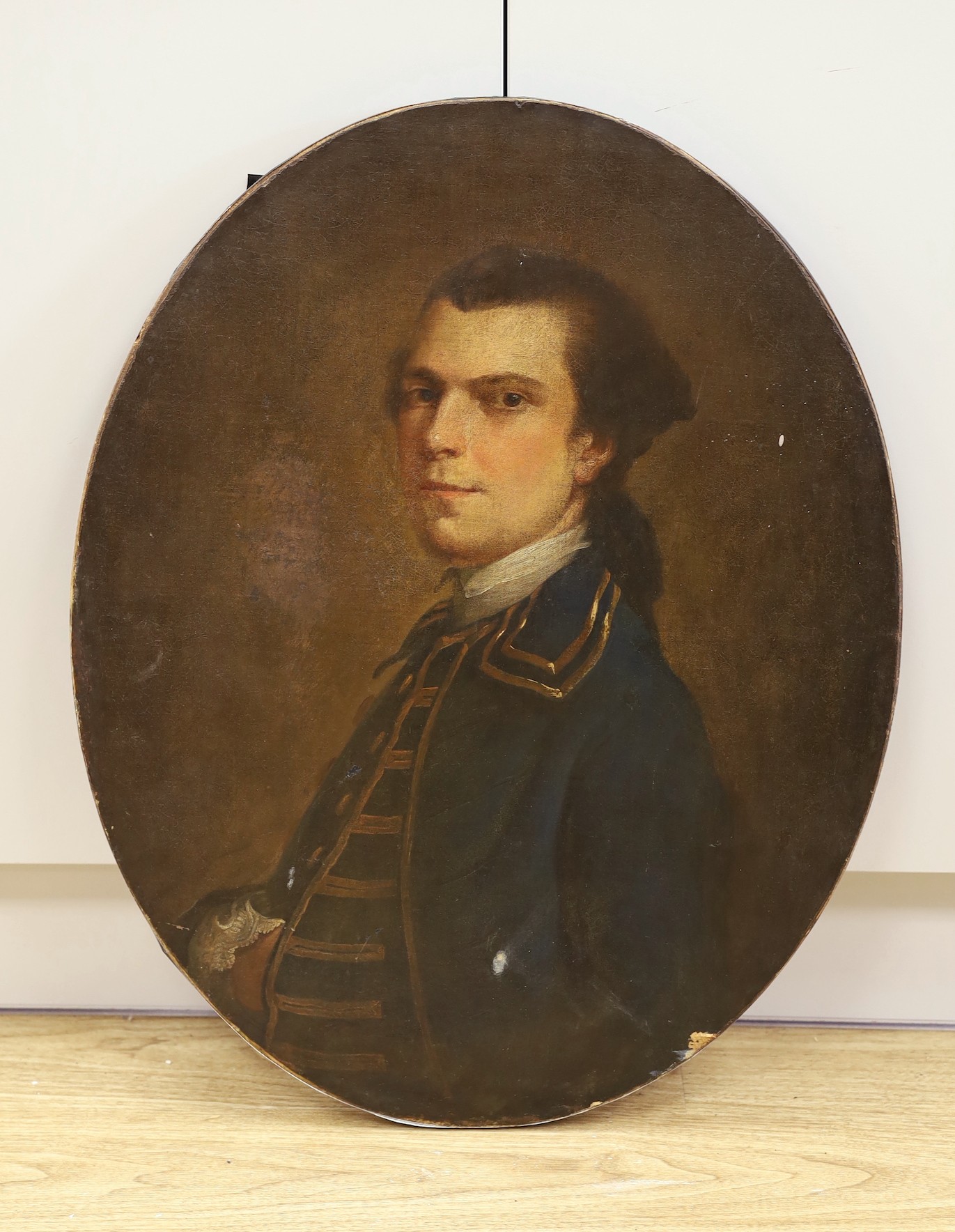 English School c.1800, oil on canvas, Portrait of a Naval officer, 70 x 56cm, oval, unframed